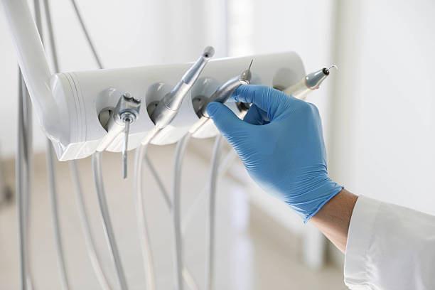Professional Tooth Extraction technician working in Wild Peach Village, TX
